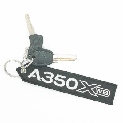 China Viable Custom Design Logo Cloth Keychain Key Chain Embroidery for sale