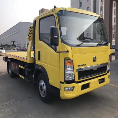 China Carbon Steel. Stainless Steel SINOTRUK HOWO 4x2 RHD Road Rescue Vehicle Flatbed Tow Truck Street Wrecker for sale