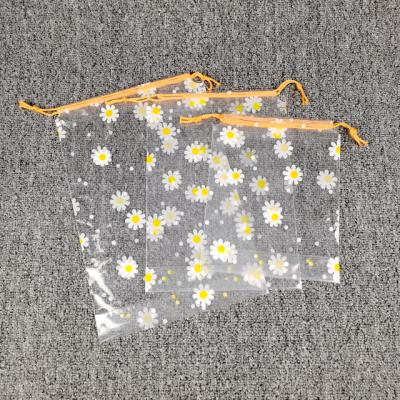 中国 Wholesale High Quality Goods Moisture Proof Spot Cute Factory Price Gift Cute Printed Plastic Drawstring Bag 販売のため