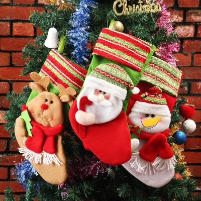 China Christmas Day Decorative Hanging Christmas Stocking Pile Decorations Personalized Small Candy Gift Bags Christmas Dangling Socks for sale