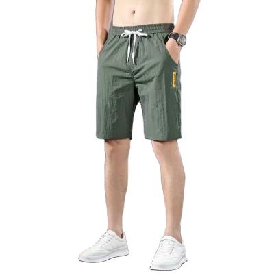 China 2023 Custom Summer QUICK DRY Comfortable 100% Polyester Shorts With Pockets Mens Beach Pants for sale