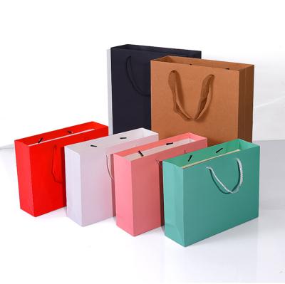 China Custom Recyclable Shopping Mall Packaging Gift Bag Clothing Store Womens Paper Bag for sale