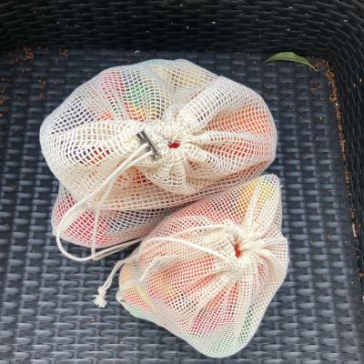 China Cotton Travel Makeup Handled Straw Shoulder Net Bag Vegetables Cosmetic Bag for sale