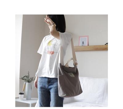 China - Custom New Fashion Design Logo Casual Style Solid Color Handbag Canvas Handbag for sale