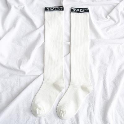 China QUICK DRY Black White High Knee Socks Korean Style Dress Preppy Cotton Calf Sokkis Winter Knee High Socks Long High Knee Socks for sale