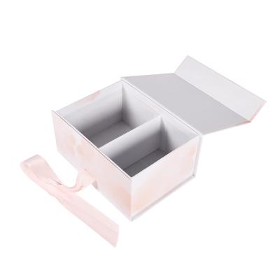 China Recycle Cardboard Rigid Compartments 2 Dividers Tops Skincare Bottles Packaging Gift Box With Ribbon Closure for sale