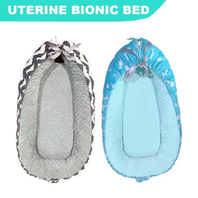 China Modern Uterine Uterine Bionic Medium Bed Crib Folding Baby Crib Folding Crib Portable Washable Anti-pressure for sale