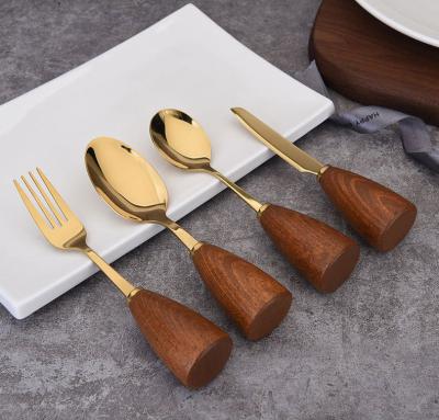 China Stocked Luxurious Gold Plating Cutlery DD410 Set Business Gift Wood Handle Table Knives Spoon Forks Flatware for sale