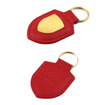 China Companies in the running car logo key chain PU shield key chain customizable logo for sale