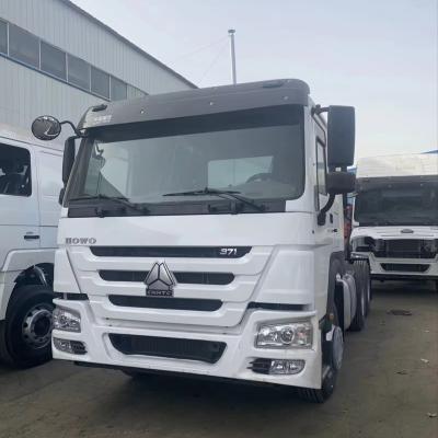 China SINOTRUK HOWO 6*4 Tractor Made in China Left hand dr ive Right hand dr ive truck tractor head 6.8*2.5*3.1 for sale