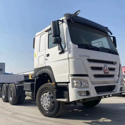 China Brand used RHD or lHD 6X4 HOWO tractor truck 371HP 375HP 420HP with 1600L extra fuel tank 6.8*2.5*3.1 for sale