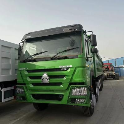 China Sinotruk green 8*4dump truck HOWO dump truck tractor > 8L for sale