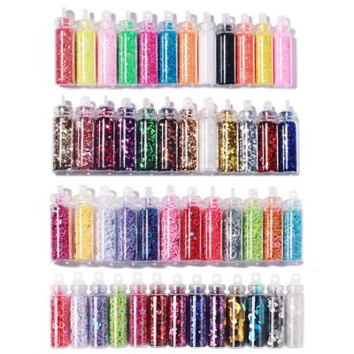 China 3d Nail Art DIY Decoration 12 Bottles Nail Glitter Powder Ultra-thin Nail Glitter Powder 3d Flakes DIY Shiny Acrylic Manicure Decorations for sale