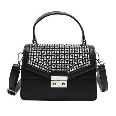 China Daily Ladies Studded New Models Rivet Shoulder Bag Small PU Handbags Women Purses for sale