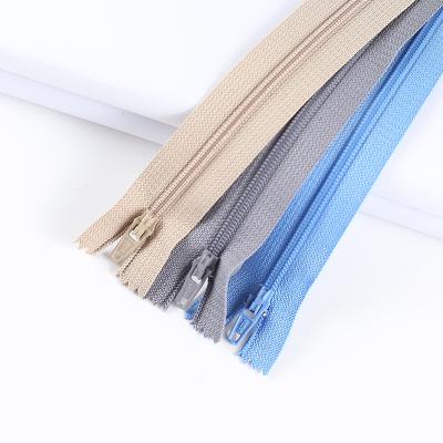 China Auto Lock Netting 3# 5# Colored Open End Colorful Invisible Nylon Zipper For Clothes Pants Or Home Textile for sale