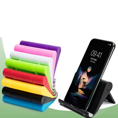 China PORTABLE Custom Logo Gift Mobile Phone Tablet Bracket Mobile Phone Holder Stand Folding Adjustable Desk Stand for sale