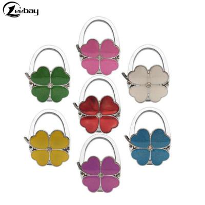 China Nickel Free Popular Flower Purse Handbag Hangers, Foldable Table Top Purse Bag Hanger for sale