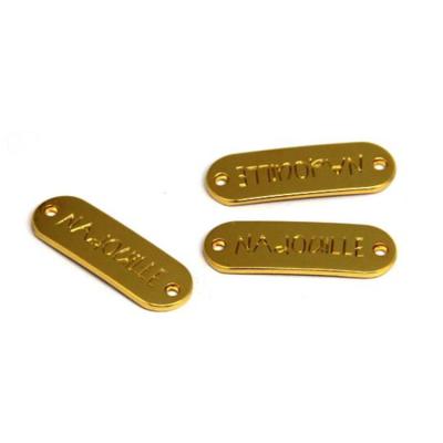 China Nickel Free Garment Accessories Metal Logo Gold Metal Label Customized Logo High Quality for sale