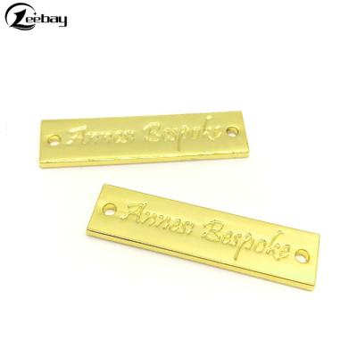 China Nickel Free Gold Plated Accessories Metal Label Custom Sewing Tag For Garment for sale