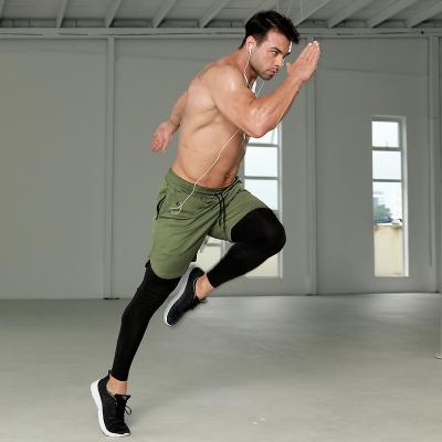 China Breathable 2022 Customized Men Polyester Fitness Compression Pants Wholesale Sports Running Leggings with Gym Shorts 2 in 1 for sale