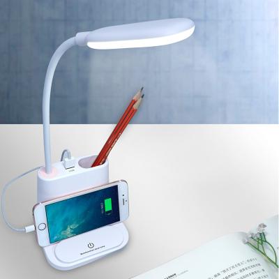 China Functions USB Radio Charging Desk Lamp Multifunctional Modern Smart Portable Adjustable Folding Desk Lighting Reading LED Desk Lamp for sale