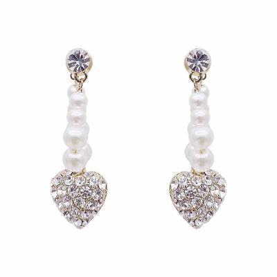 China Newest CLASSIC Zircon Inlaid Heart Bead Tragus Crystal Chain Dangle Earrings for sale