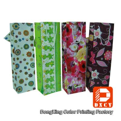 China Coated Art Paper Small Christmas Paper Gift Bags High Glossy Lamination for sale