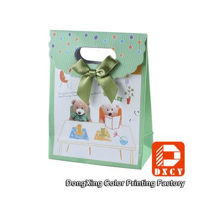 China Cute Green Paper Gift Bags Velcro Matt Lamination Bow Tie Decoration Style for sale