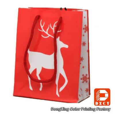 China Environmentally Friendly Paper Christmas Gift Bags With Custom Printed Logo for sale