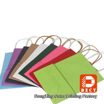 China Luxury Custom Printed Paper Gift Bags Fashionable Drawstring For Shopping for sale