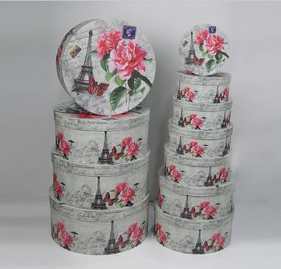 China Environmentally Friendly Round Gift Boxes With Lids White Flower And Tower Design for sale