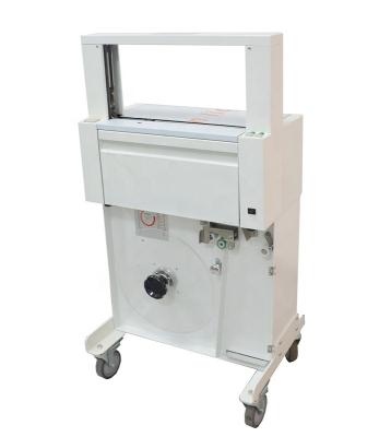 China Convenient Food Solution Box Packing Machine Carton Wrapping Band Machine With Shelf for sale