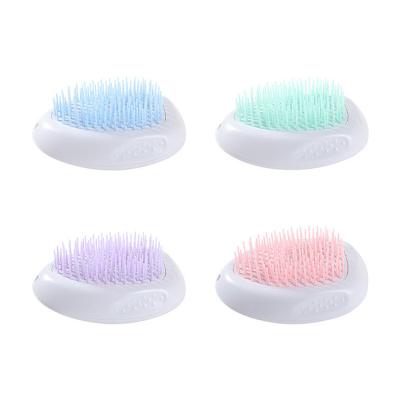 China Viable Luxury Comfortable Pet Massager Brush Pet Cleaning Brush Soft Dog Cat Grooming Brush for sale