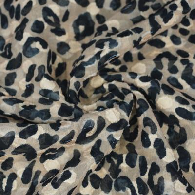 China Fashion Cut Pattern Leopard Print Fusible Fabric For Dresses High Quality 100% Polyester Fancy Fabric for sale