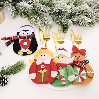 China New Products Christmas Non-Woven Fabric And Gingerbread Man Creative Home Dining Table Fork Set Decoration Knife Party Supplies for sale