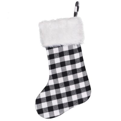 China Black and White Christmas Ornament Christmas Plaid Christmas Stocking Gift Bag Christmas Tree Decoration Candy Bag for sale