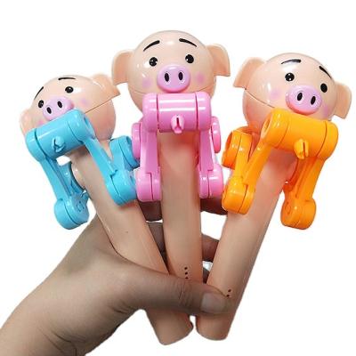 China ABS Plastic Lollipop Robot Toys For Candy With Light And Music Pig Cartoon Design for sale