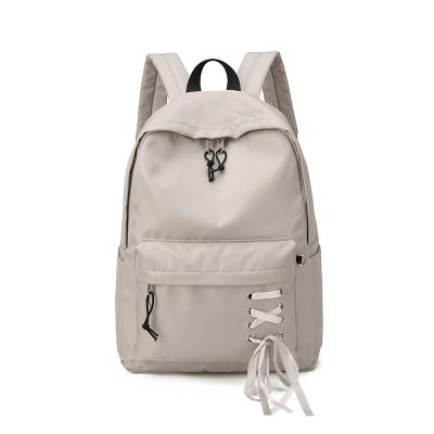 China Customized School Solid Color Style Waterproof Practical Swapping Backpack for sale