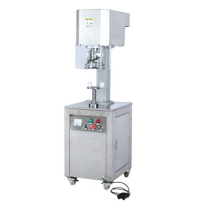 China Beverage New Product Vertical Non-rotating Sealing Machine For Cans for sale