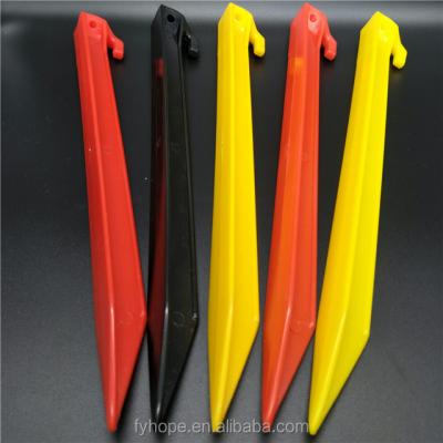 China Factory Sale ABS XF-3011 31 Pin Plastic Tent Stakes Environmental Ground Flat Stake pp *2.3cm Red Yellow ABS Plastic Tent for sale