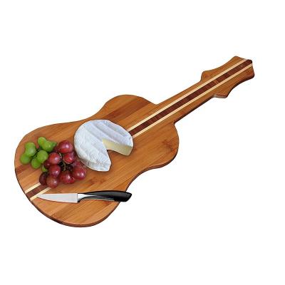 China Sustainable Kitchen Bamboo Guitar Shaped Bamboo Serving Board Eco - Friendly Bamboo Cutting Board for sale