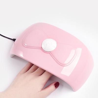 China Fashion Hadiyah Factory 54W UV LED Nail Lamp Bowknot Nail Dryer Lamp 30s/60s/90s Nail Polish Auto Sensor Manicure Tools for sale