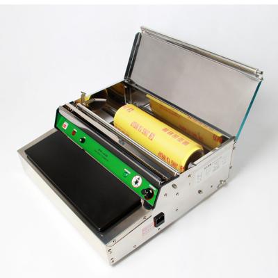 China Wholesale Food Small Plastic Cling Film Packing Slitter Food Packaging Machine for sale