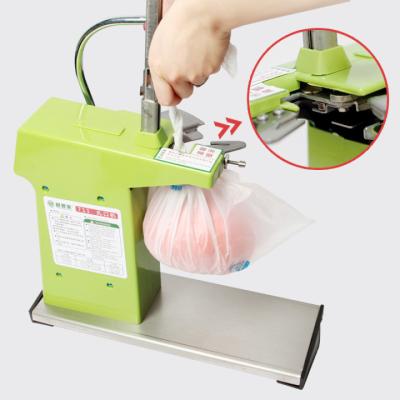 China 711 Type Food Binding Machine For Supermarket Packing Shopping Bag Wrapping Machine for sale