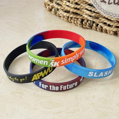 China Custom printed silicone wristbands with printed text or logo for sale