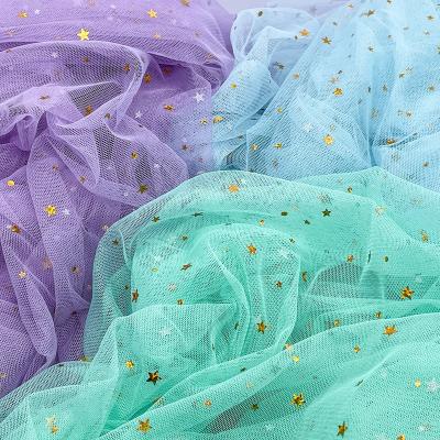 China DIY Sheer Glitter Sequin Tulle Fabric Roll Wedding Decoration Glitter Print Tulle Fabric Foil Tulle for sale