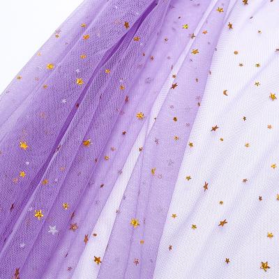 China Sheer Tulle Fabric Manufacturer Dress Garment Girls Decoration Star Shape Sequin Metallic Foiling Tulle Fabric for sale