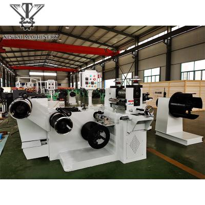 China Hotels high precision slitting wire winding machine from BAOJI XINTAI MACHINARY for sale in China. for sale