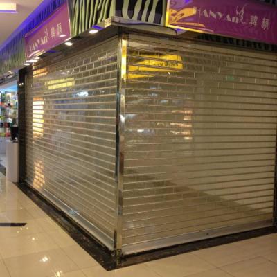 China Sliding Fancy Commercial Outdoor Explosion Proof Fire Insulated Transparent Roller Shutter Door for sale