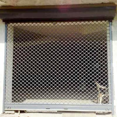 China Single Layer And Double Layer Fireproof Mesh Horizontal Vertical Rolling Shutter Door Standard Sizes With Foam for sale